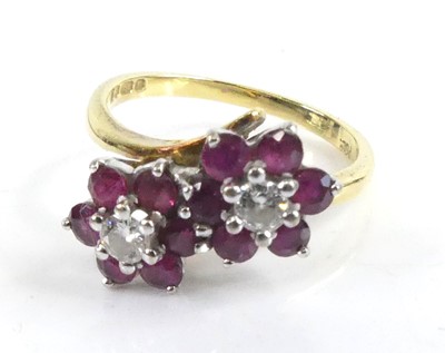 Lot 2507 - An 18ct yellow and white gold, ruby and...