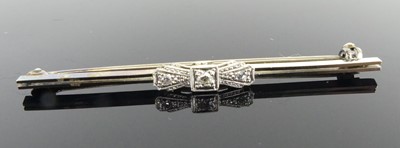 Lot 2519 - A white metal diamond bar brooch, comprising...