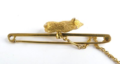 Lot 2521 - A yellow metal bar brooch in the form of a...