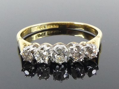 Lot A yellow and white metal diamond five-stone...