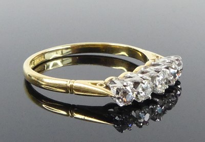 Lot A yellow and white metal diamond five-stone...