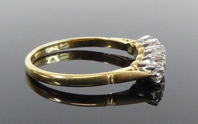 Lot A yellow and white metal diamond five-stone...