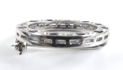 Lot 2505 - A white metal sapphire and diamond circular...