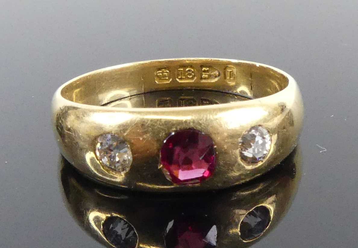 Lot 2517 - An 18ct yellow gold ruby and diamond dress...