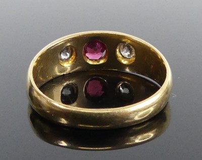 Lot 2517 - An 18ct yellow gold ruby and diamond dress...