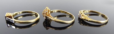 Lot 2518 - Three rings, comprising an 18ct yellow gold...