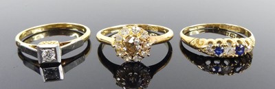 Lot 2518 - Three rings, comprising an 18ct yellow gold...