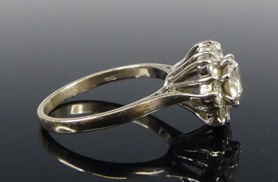 Lot 2515 - An 18ct white gold diamond circular cluster...