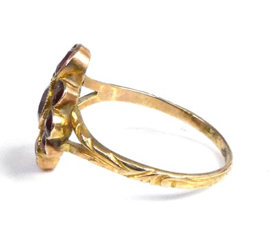 Lot 2516 - A yellow metal garnet navette cluster ring,...