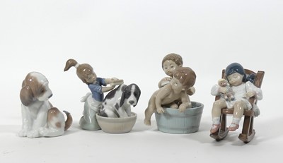 Lot 30 - Four Lladro figures 'Bashful Bather' no.05455,...