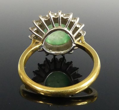 Lot 2524 - A yellow and white metal emerald and diamond...