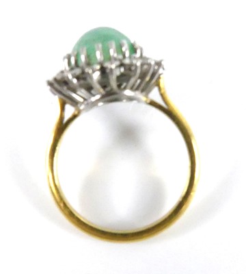 Lot 2524 - A yellow and white metal emerald and diamond...