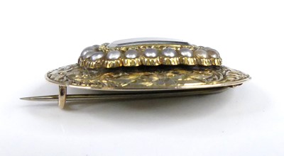 Lot 2530 - A Victorian yellow metal oval mourning brooch,...
