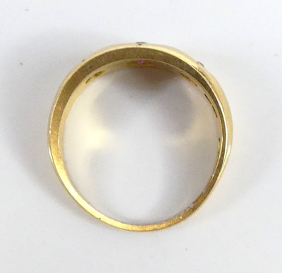 Lot 2591 - An 18ct yellow gold, ruby and diamond dress...