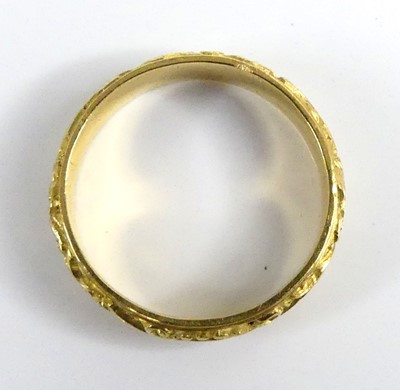 Lot 2594 - A yellow metal 4.7mm D-shaped wedding band...