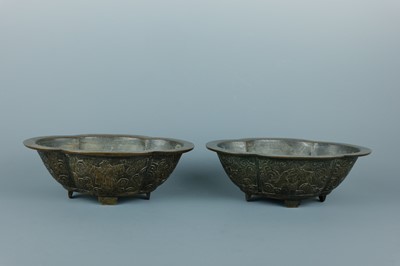 Lot A pair of Chinese bronze quatrefoil-shaped...