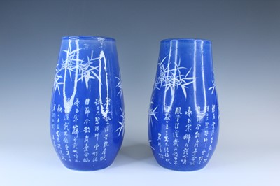 Lot A rare pair of Japanese blue-glazed...