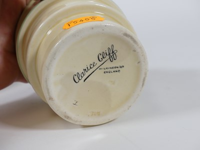 Lot 169 - A Clarice Cliff pottery honey pot and cover,...