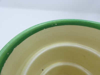 Lot 169 - A Clarice Cliff pottery honey pot and cover,...