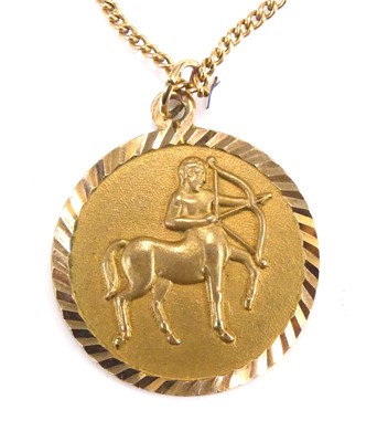 Lot 2545 - A modern 9ct gold zodiac pendant for...