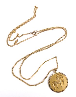 Lot 2545 - A modern 9ct gold zodiac pendant for...