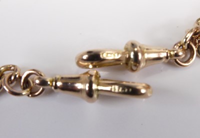 Lot 2552 - A 9ct gold graduated curblink double watch...