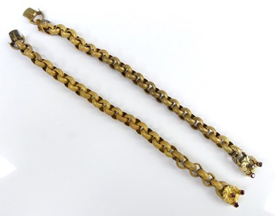 Lot 2554 - A pair of textured yellow metal belcher link...