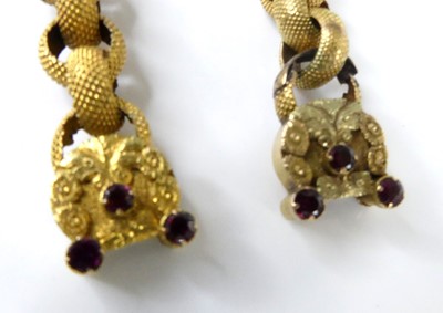 Lot 2554 - A pair of textured yellow metal belcher link...