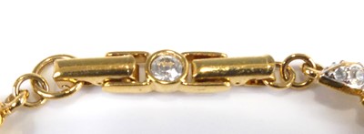 Lot 2555 - A Swarovski gilt metal crystal set hinge...