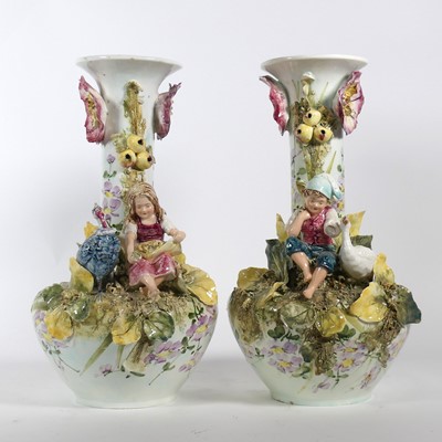 Lot 7 - A pair of floral decorated porcelain vases,...