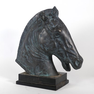 Lot 15 - A bronzed metal horse head bust, mounted to an...