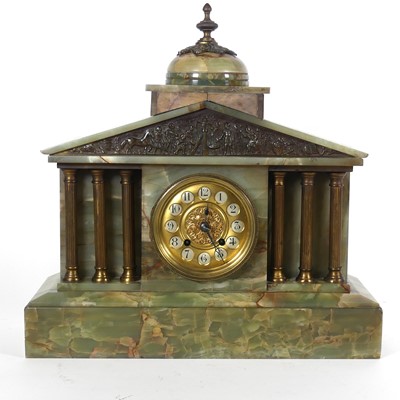 Lot 25 - A late 19th century green onyx mantel clock of...