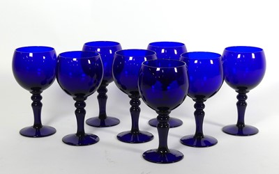 Lot 36 - A set of eight Bristol blue glass goblets,...