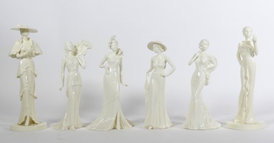 Lot 39 - A collection of four Coalport "In Vogue"...