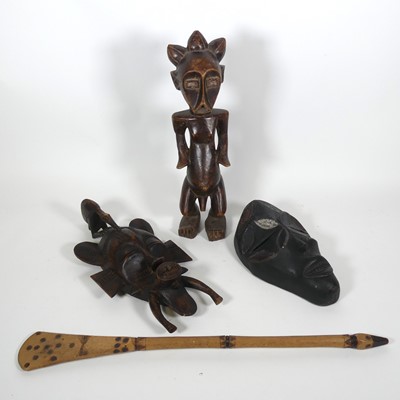 Lot 48 - An African carved wooden fertility figure,...