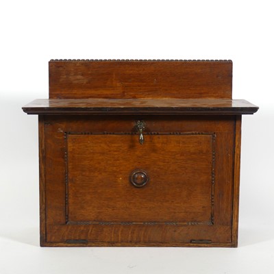 Lot 88 - An early 20th century oak smoker's cabinet...