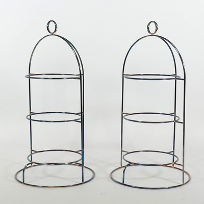 Lot 111 - A pair of plated wirework three-tier stands, h....