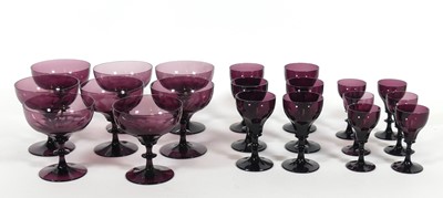 Lot 114 - A collection of amethyst glass drinking...