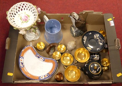 Lot 137 - A collection of ceramics to include a figural...