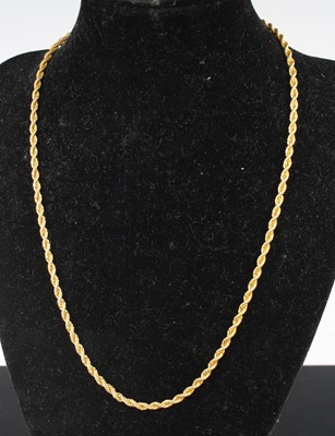 Lot 323 - A gold plated rope twist necklace