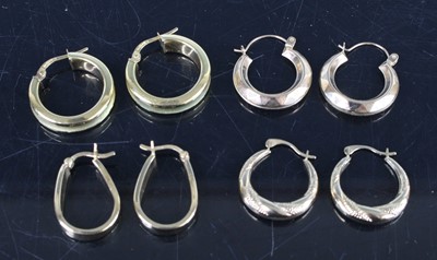 Lot 339 - Four pairs of modern 9ct hollow gold hoop...