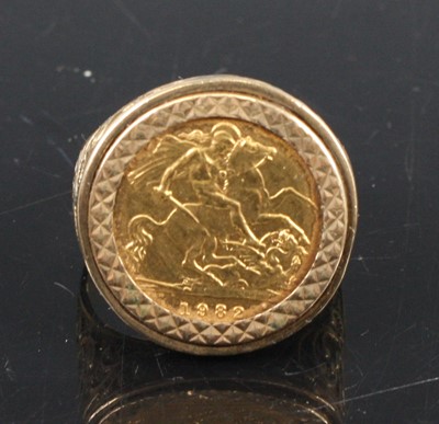 Lot 347 - A modern 9ct gold half sovereign set signet...