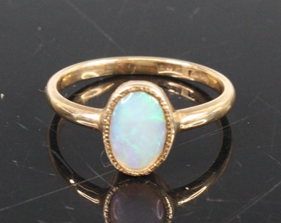 Lot 356 - A 9ct gold cabochon opal set dress ring, opal...