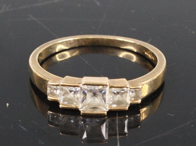 Lot 357 - A modern 9ct gold white paste set half hoop...