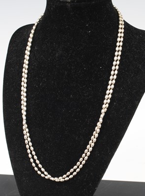 Lot 373 - A modern beaded silver long neck chain, 100cm,...