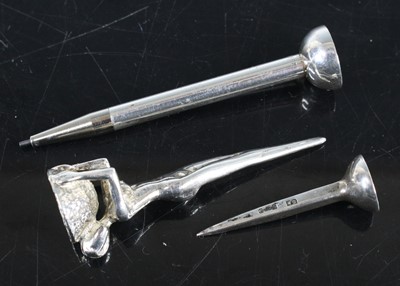 Lot 385 - A sterling silver propelling pencil disguised...