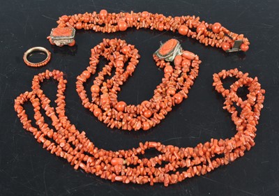 Lot 395 - Two coral necklaces, coral bracelet, and a...