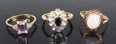 Lot 362 - A modern 9ct gold sapphire and diamond point...