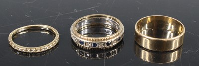 Lot 363 - A modern 9ct gold wedding band size M,...