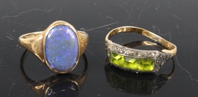 Lot 364 - A 9ct gold black opal set dress ring, sponsor...